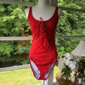 Venus two-piece red bathing suit.